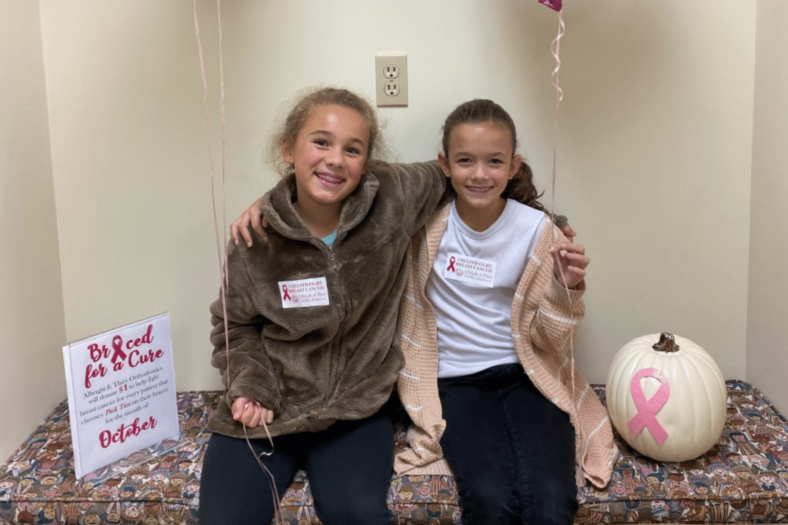 Albright and Thiry Orthodontics Encourages Patients to ‘Smile in Pink’ to Support Breast Cancer Awareness